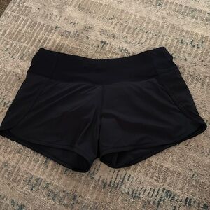 Lululemon navy speed up shorts! Size 4!